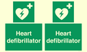 green-background-with-white-text-and-heart-defibrillator-symbol--white-cross-and~